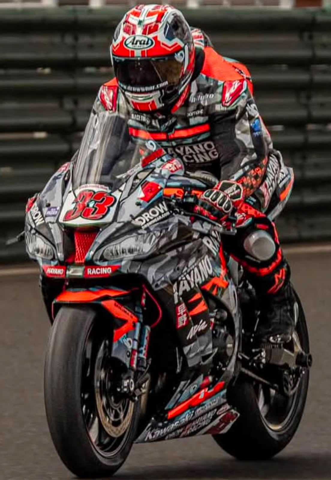 Front view of Adam Brown racing the number 33 Kawasaki ZX-10R