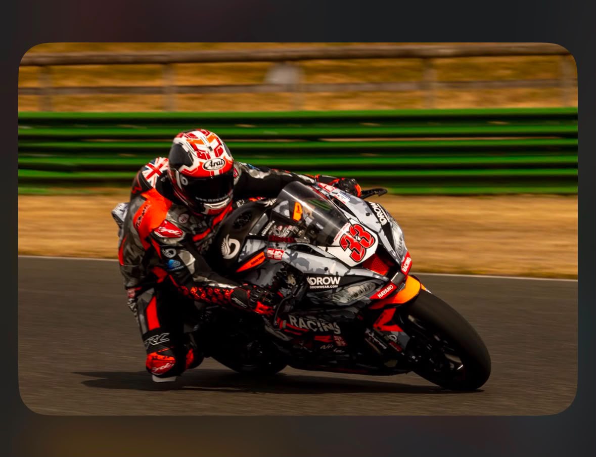 Adam Brown cornering the number 33 Kawasaki ZX-10R